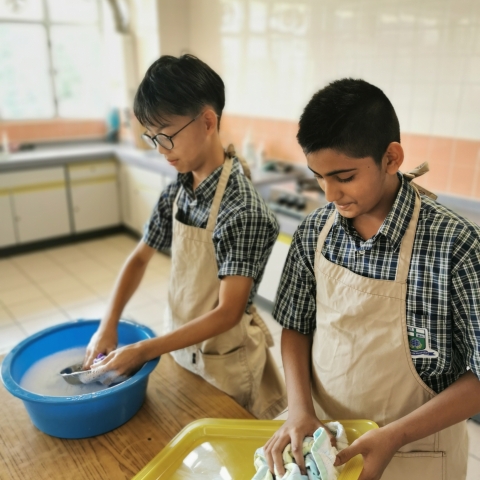 Final washing up in the  Cookery lesson
